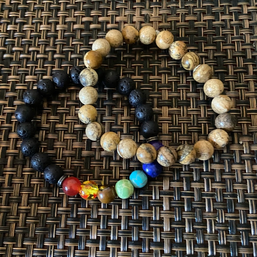 Macy’s Two NIB stretch wood bracelets. Tigers Eye & Chakra with black beads.